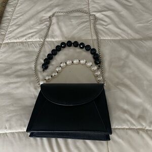 Black Bag with 3 detachable. "pearl", Bead, and chain handles.Dressy or casual